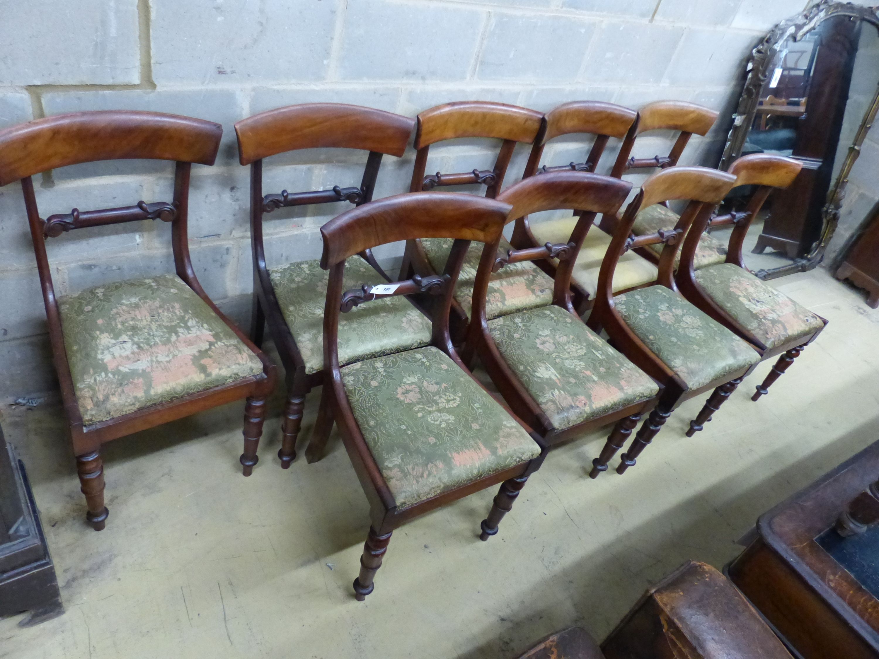 A set of nine early William IV mahogany dining chairs